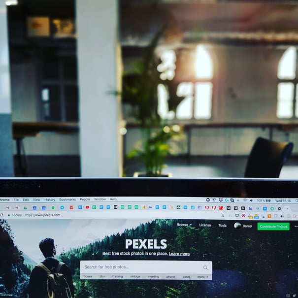 Monitor Displaying Pexels Website